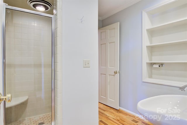 6664 Lake Shore Dr, Hickory, NC 28601 - full bath with a shower stall, wood finished floors, crown molding, and baseboards