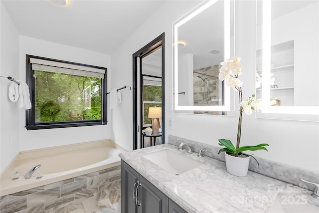 4339 Shannamara Dr, Matthews, NC 28104 - full bath featuring a garden tub, vanity, and a shower