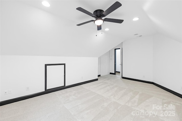 4339 Shannamara Dr, Matthews, NC 28104 - bonus room with vaulted ceiling, recessed lighting, light colored carpet, baseboards, and a ceiling fan