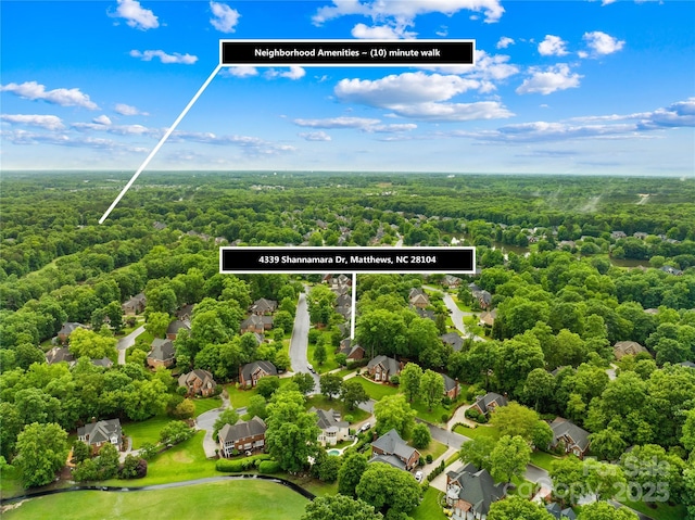 4339 Shannamara Dr, Matthews, NC 28104 - aerial view of residential area with a heavily wooded area