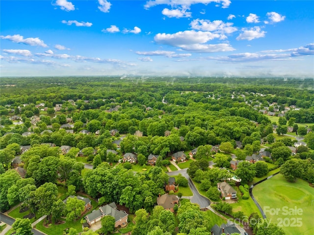 4339 Shannamara Dr, Matthews, NC 28104 - aerial perspective of suburban area featuring a heavily wooded area