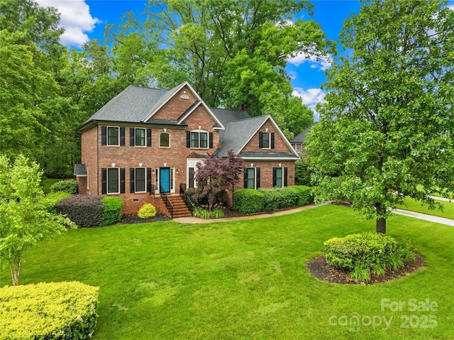 4339 Shannamara Dr, Matthews, NC 28104 - view of front of property with a front yard and brick siding