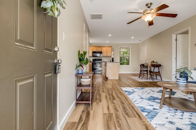 10 Coral Berry Dr, Candler, NC 28715 - living room with light wood finished floors, a ceiling fan, baseboards, and recessed lighting