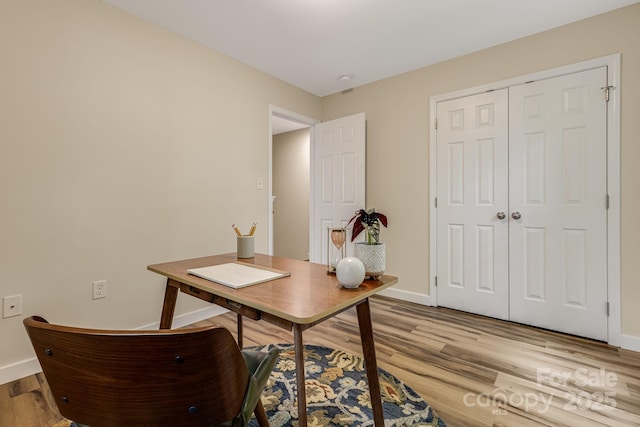 10 Coral Berry Dr, Candler, NC 28715 - home office featuring light wood-style flooring and baseboards