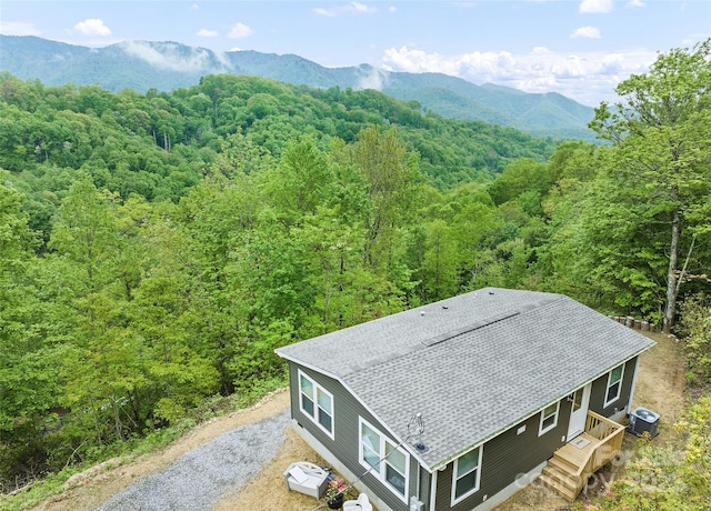 328 Mountain Lion Trl, Maggie Valley, NC 28751 - aerial view of property and surrounding area featuring a forest and a mountainous background