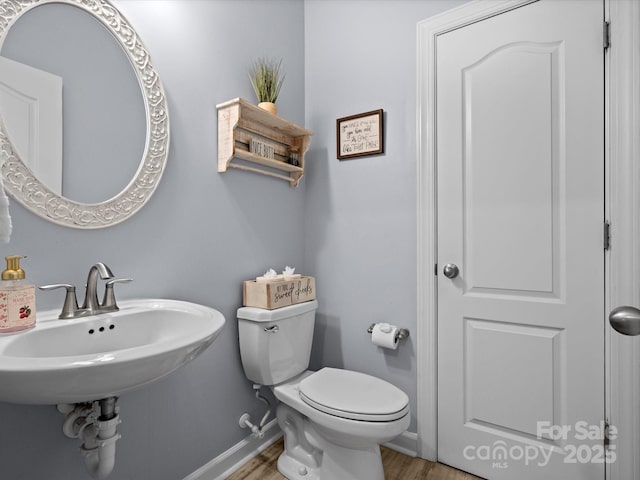 5013 Hamilton Mill Dr, Waxhaw, NC 28173 - bathroom featuring wood finished floors and toilet