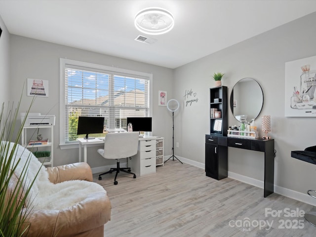 5013 Hamilton Mill Dr, Waxhaw, NC 28173 - home office featuring light wood-style floors and baseboards