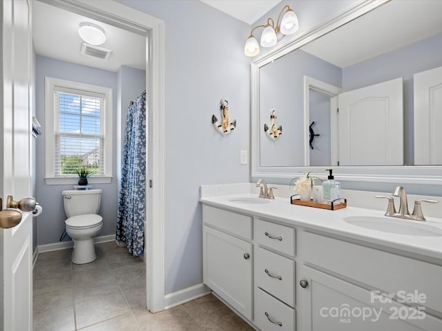 5013 Hamilton Mill Dr, Waxhaw, NC 28173 - full bathroom featuring double vanity and tile patterned flooring