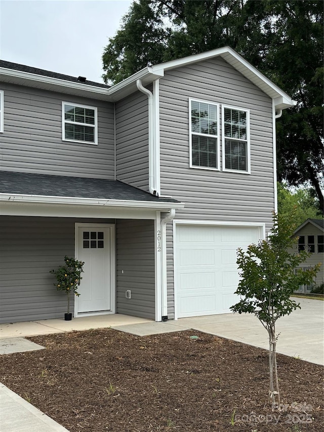2012 Crown Point Dr Unit A, Albemarle, NC 28001 - view of front of house featuring a garage and driveway