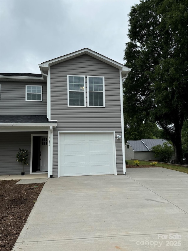2012 Crown Point Dr Unit A, Albemarle, NC 28001 - view of front of home with concrete driveway and an attached garage