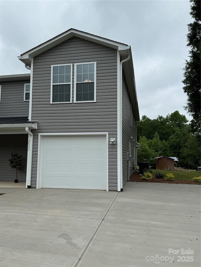 2012 Crown Point Dr Unit A, Albemarle, NC 28001 - view of front of house featuring concrete driveway and an attached garage