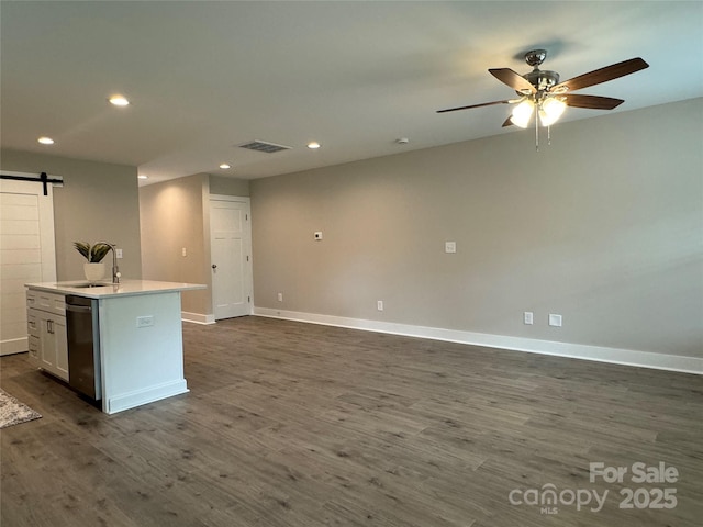 2012 Crown Point Dr Unit A, Albemarle, NC 28001 - kitchen with a sink, dishwasher, a barn door, a kitchen island with sink, and recessed lighting