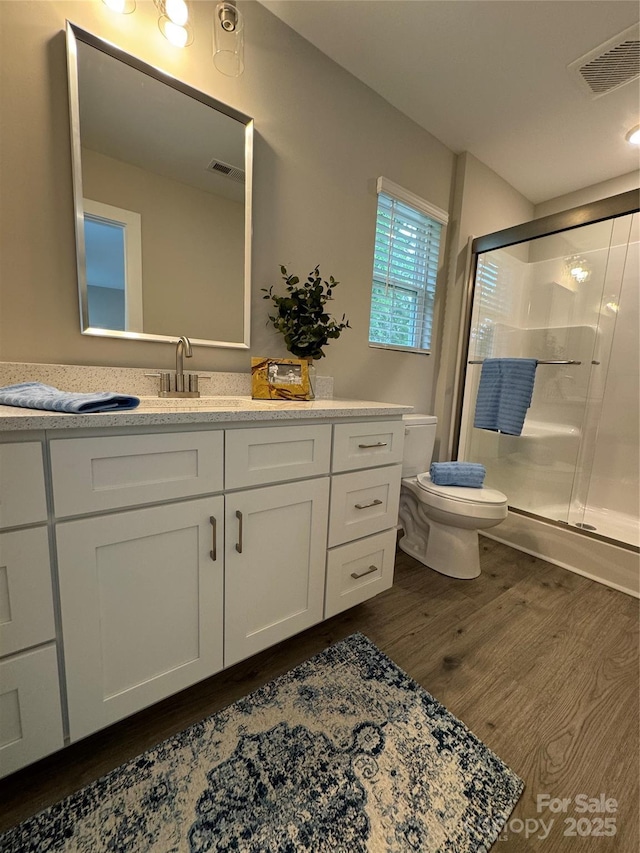 2012 Crown Point Dr Unit A, Albemarle, NC 28001 - full bath with wood finished floors, toilet, a shower stall, and vanity