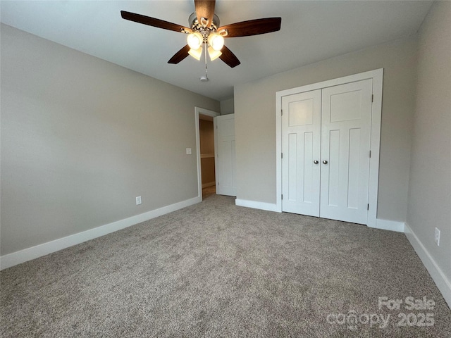 2012 Crown Point Dr Unit A, Albemarle, NC 28001 - unfurnished bedroom featuring light carpet, baseboards, a closet, and a ceiling fan