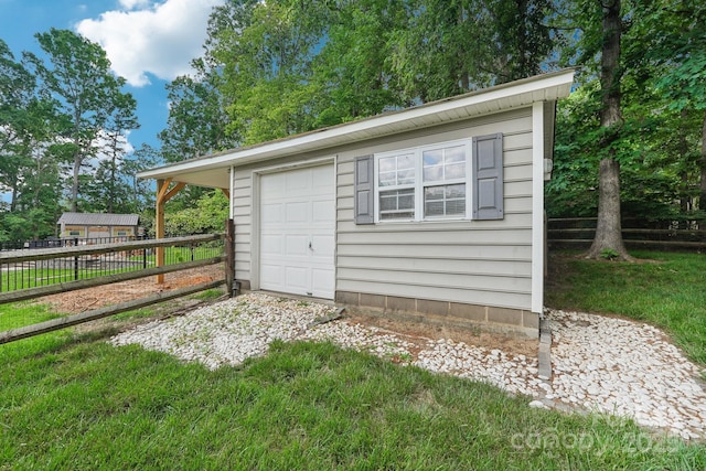view of outbuilding with an outdoor structure and a garage