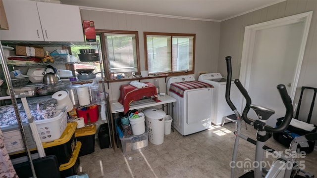 718 Dogwood Ave, Lincolnton, NC 28092 - clothes washing area with ornamental molding, cabinet space, and separate washer and dryer