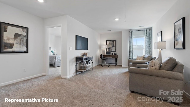 living area with carpet, baseboards, and recessed lighting