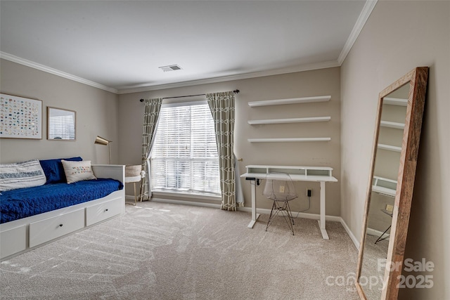 bedroom with ornamental molding, carpet floors, and baseboards