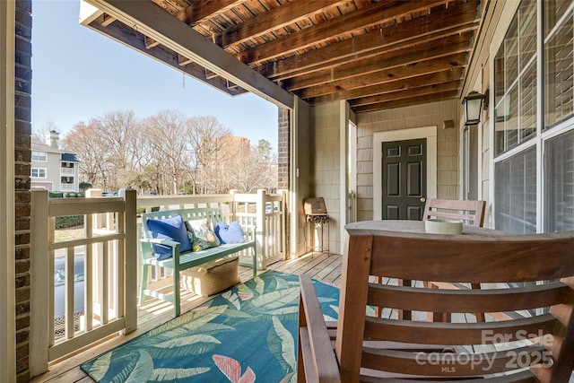 view of wooden balcony featuring a wooden deck