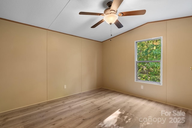 2930 Clarks Chapel Rd, Lenoir, NC 28645 - spare room featuring wood finished floors, lofted ceiling, a ceiling fan, and crown molding
