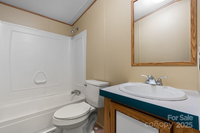 2930 Clarks Chapel Rd, Lenoir, NC 28645 - full bath featuring shower / washtub combination, toilet, vanity, a textured ceiling, and ornamental molding