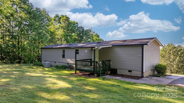 2930 Clarks Chapel Rd, Lenoir, NC 28645 - rear view of property featuring crawl space, a yard, cooling unit, and a deck