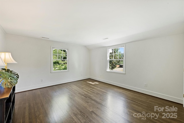 5806 Bentway Dr, Charlotte, NC 28226 - unfurnished room featuring plenty of natural light, wood finished floors, baseboards, and vaulted ceiling