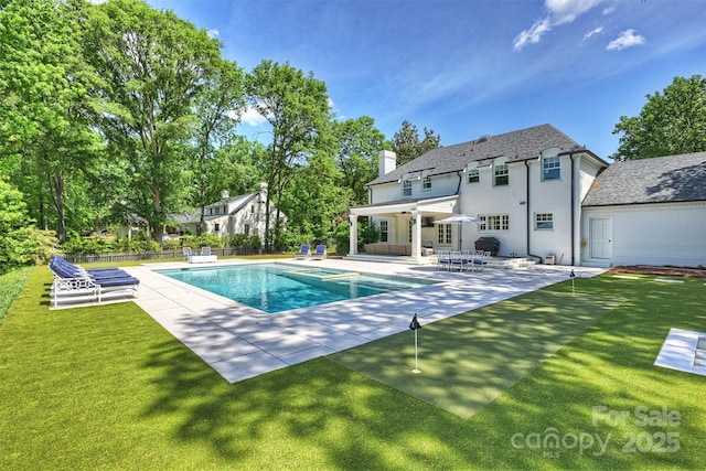 5806 Bentway Dr, Charlotte, NC 28226 - view of pool with a putting green, a patio, a pool with connected hot tub, and outdoor lounge area