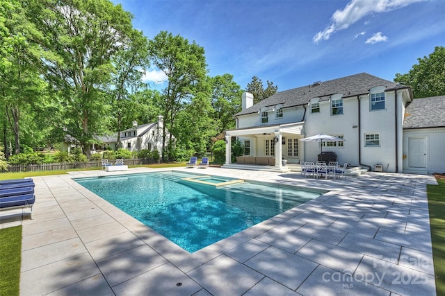 5806 Bentway Dr, Charlotte, NC 28226 - view of swimming pool featuring a patio area, fence, and a pool with connected hot tub