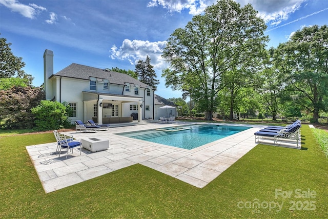 5806 Bentway Dr, Charlotte, NC 28226 - view of swimming pool with an outdoor fire pit, a patio area, a yard, and a pool with connected hot tub