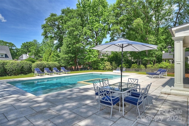 5806 Bentway Dr, Charlotte, NC 28226 - view of pool with a patio area, fence, and view of wooded area