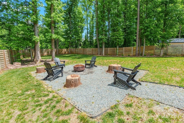 view of patio with a fire pit