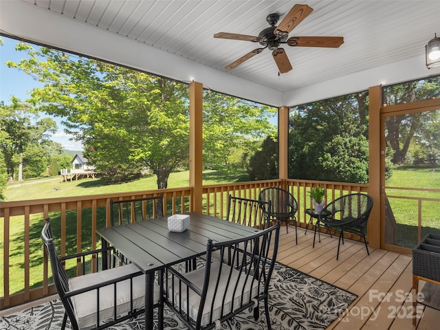4 Greene Ln, Fletcher, NC 28732 - deck featuring ceiling fan, outdoor dining space, a yard, and view of scattered trees