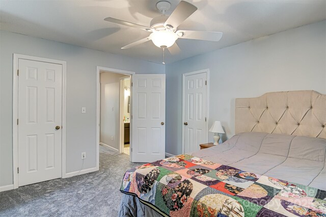 bedroom with carpet flooring, baseboards, and a ceiling fan