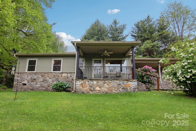 51 Atari Rd, Waynesville, NC 28786 - view of front of property with a ceiling fan, a front yard, and stone siding