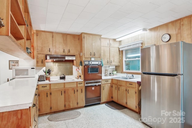 51 Atari Rd, Waynesville, NC 28786 - kitchen featuring white appliances, light countertops, a sink, and under cabinet range hood