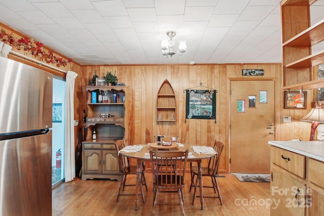 51 Atari Rd, Waynesville, NC 28786 - dining room with wooden walls and light wood finished floors