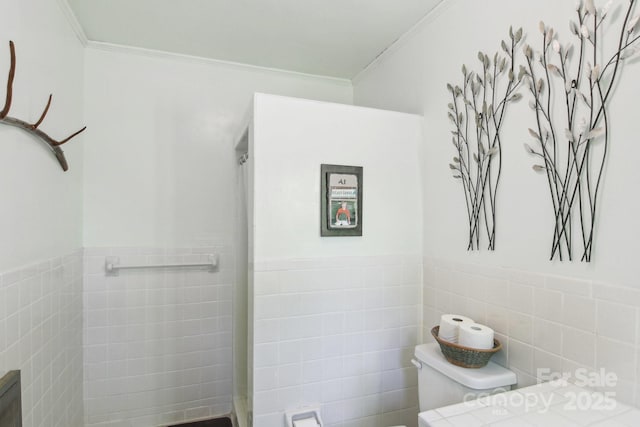 51 Atari Rd, Waynesville, NC 28786 - bathroom featuring toilet, tile walls, crown molding, and a wainscoted wall