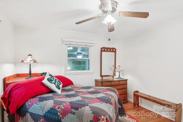 51 Atari Rd, Waynesville, NC 28786 - bedroom featuring wood finished floors, ornamental molding, and ceiling fan