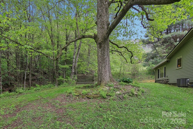 51 Atari Rd, Waynesville, NC 28786 - view of yard with central AC and a wooded view
