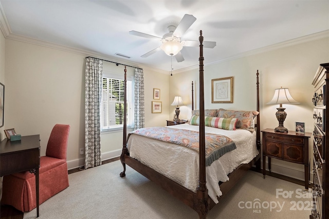 bedroom with crown molding, ceiling fan, and baseboards