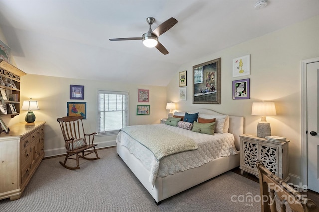 bedroom with baseboards, carpet, a ceiling fan, and vaulted ceiling