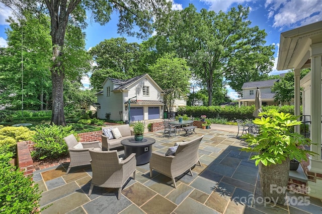 view of patio / terrace featuring an outdoor hangout area and outdoor dining space