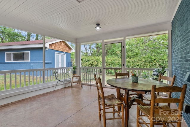 30 Joyner Ave, Asheville, NC 28806 - sunroom / solarium with concrete floors and outdoor dining space