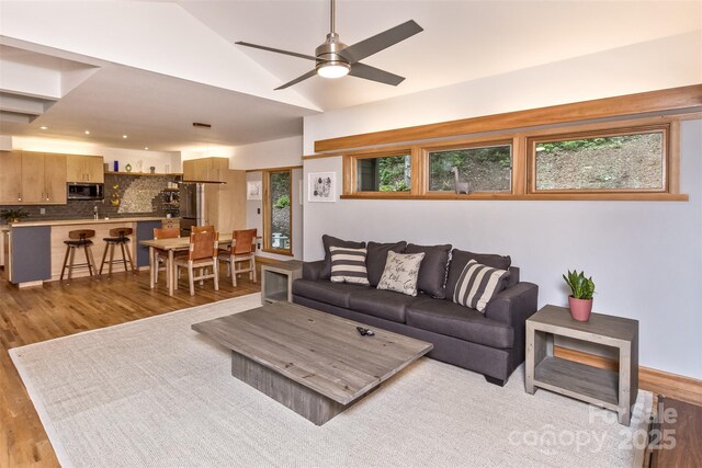 18 Balsam Ct, Arden, NC 28704 - living room with wood finished floors, ceiling fan, and vaulted ceiling
