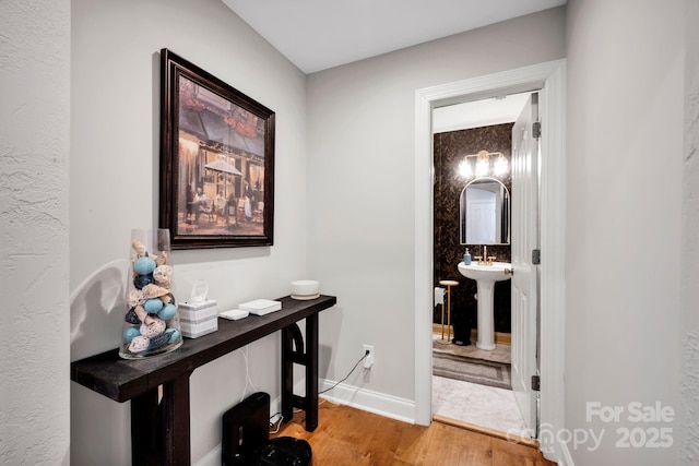 14940 Carbert Ln, Huntersville, NC 28078 - home office featuring wood finished floors, a sink, and baseboards