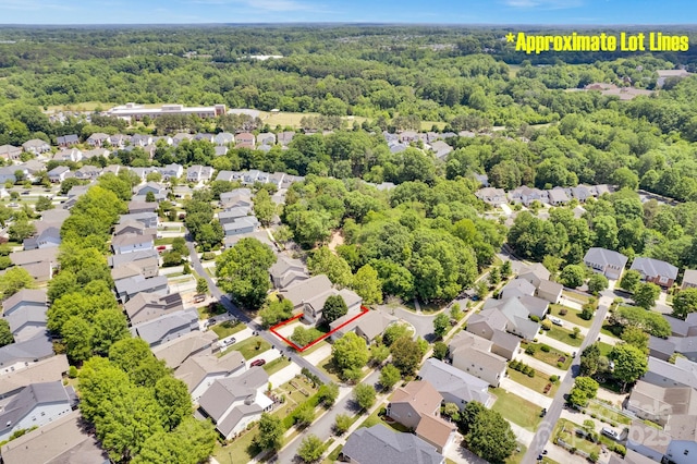 14940 Carbert Ln, Huntersville, NC 28078 - aerial view of residential area with a forest and property parcel outlined