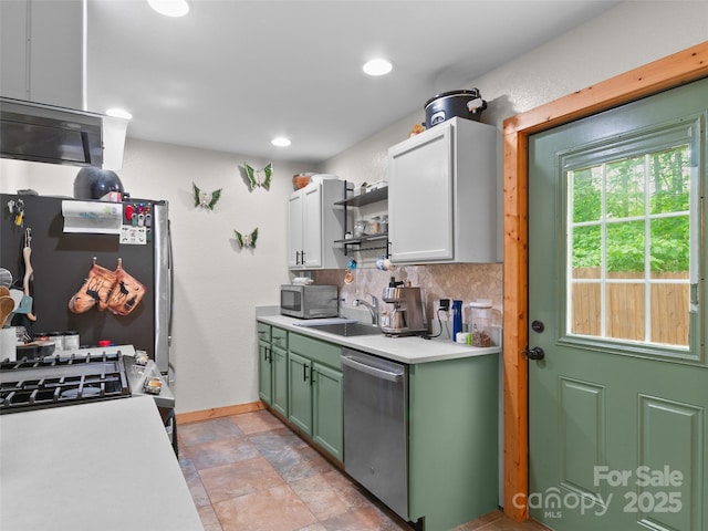 416 Secluded Cv, Waynesville, NC 28785 - kitchen featuring appliances with stainless steel finishes, green cabinetry, a sink, light countertops, and recessed lighting