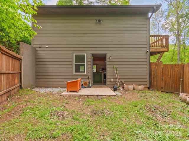 416 Secluded Cv, Waynesville, NC 28785 - rear view of property featuring a fenced backyard and a patio