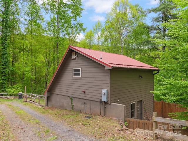 416 Secluded Cv, Waynesville, NC 28785 - view of home's exterior featuring fence and metal roof
